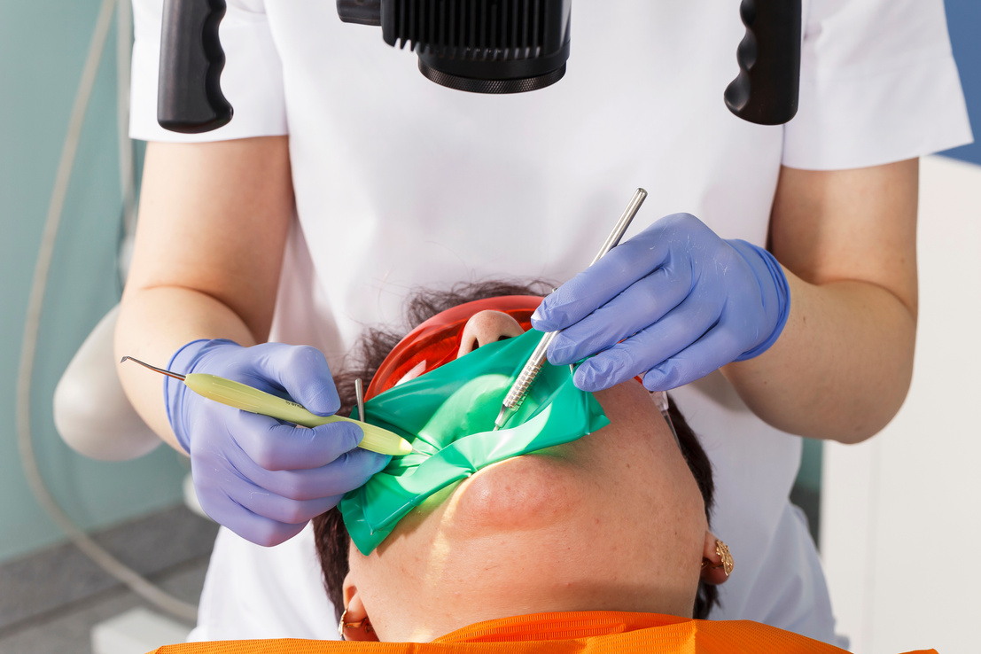 Dentist Therapist at Work, Tooth Restoration